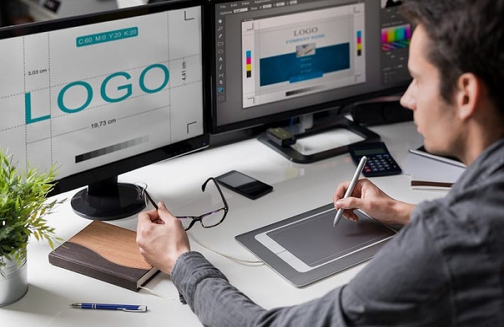 Designer creating a company logo