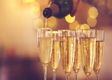 Champagne being poured at a party or event