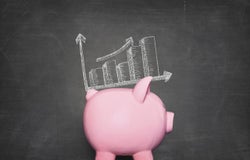 pink piggy bank against black background with a graphic of increasing piles of money on its back