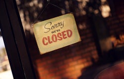 Closed sign in shop door