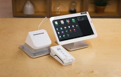 A product image of a POS till system comprised of a terminal and a card reader