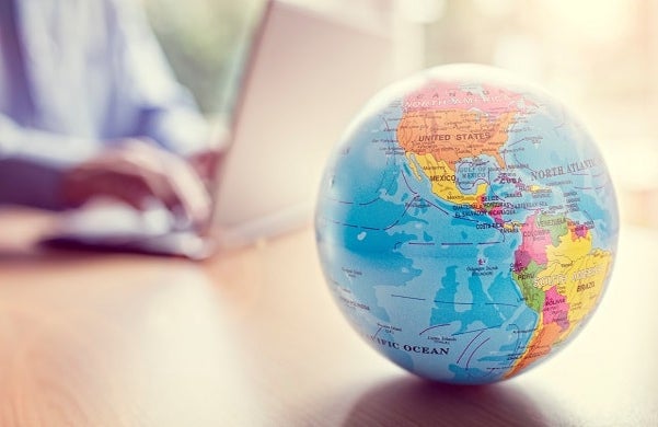 Close up of small globe on a desk