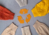 Clothing recycling. Used clothes in a circle. Ecological and sustainable fashion
