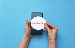 Hands holding a speech bubble saying 