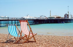 deck chairs on the beach Brigton England