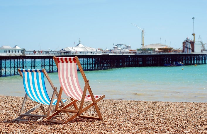 deck chairs on the beach Brigton England