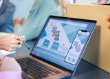 Side shot of laptop with website builder