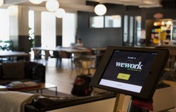 Detroit, July 26, 2019: Interior of WeWork Office in Downtown Detroit, featuring a digital sign in pad