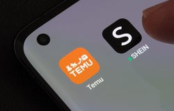 TEMU and SHEIN apps seen on the screen of smartphone. Temu app and Shein app are chinese budget shopping platforms. Stafford, United Kindom, May 2, 2023