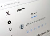 San Francisco, California - 2023: Twitter website UI is updated with new X logo after Elon Musk's rebranding in 2023, closeup page displayed on a computer screen