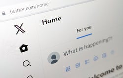 San Francisco, California - 2023: Twitter website UI is updated with new X logo after Elon Musk's rebranding in 2023, closeup page displayed on a computer screen
