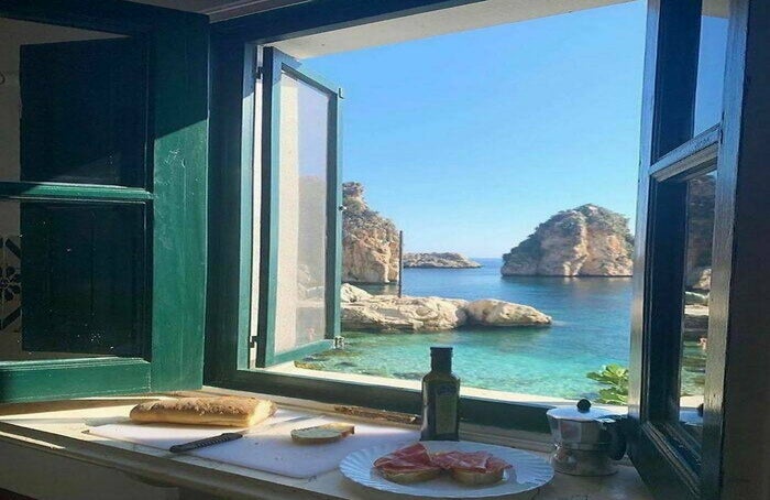 a group of businesswomen speaking at a table