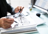 auditing paperwork for financial fraud