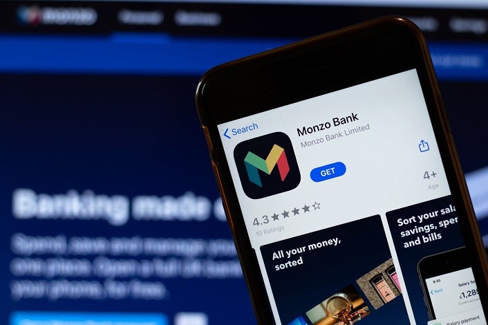 New York, USA - 15 May 2020: Monzo Bank mobile app logo on phone screen, close-up icon, Illustrative Editorial.