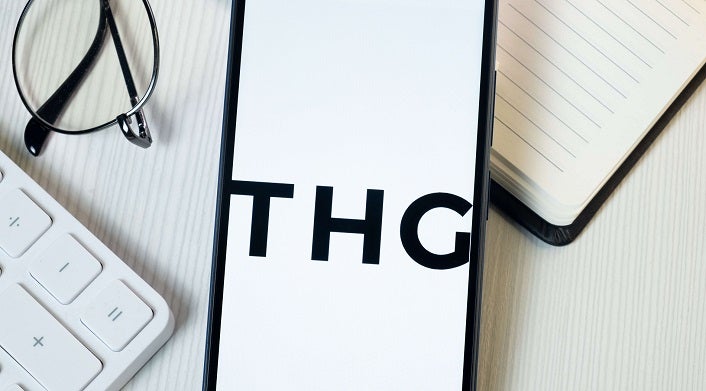 THG or The Hut Group brand logo on an iphone screen