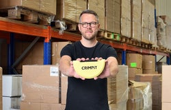 Mike Harper holding a CRIMPiT toasted sandwich maker