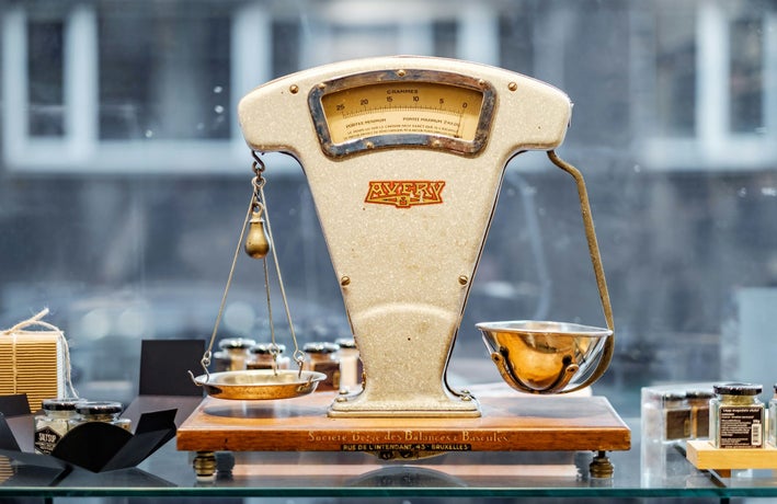 Old fashioned scales in front of a window