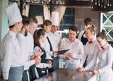 Team of restaurant staff having a meeting