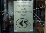 Sign in a business's window stating 