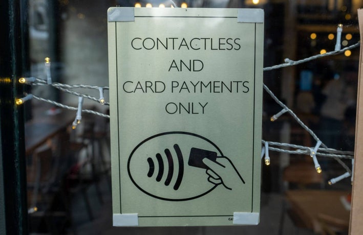 Sign in a business's window stating 