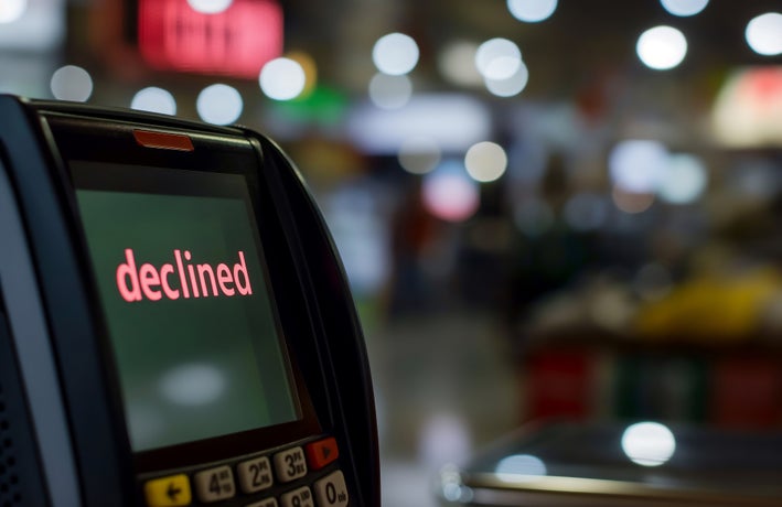 A payment terminal screen displaying the word 