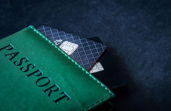 Passport containing debit and credit cards