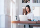 Woman working at her laptop