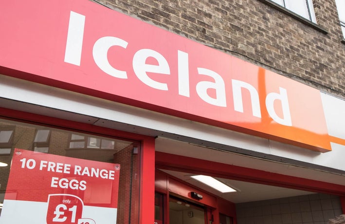 Shot outside of an Iceland supermarket with its logo prominently displayed.