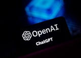 A black card displaying the OpenAI logo with a blue backdrop.