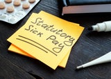 A yellow post it note reading 