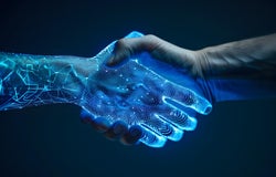 A human and an AI robot shaking hands.