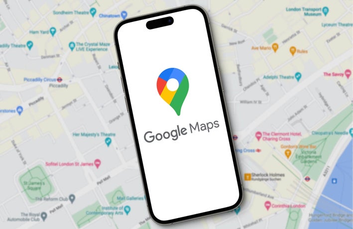 A smartphone device against a backdrop of a traditional map displaying the Google Maps logo.